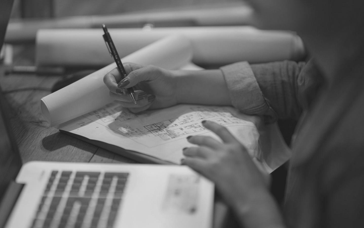 Financial analysis workspace showing charts and planning documents